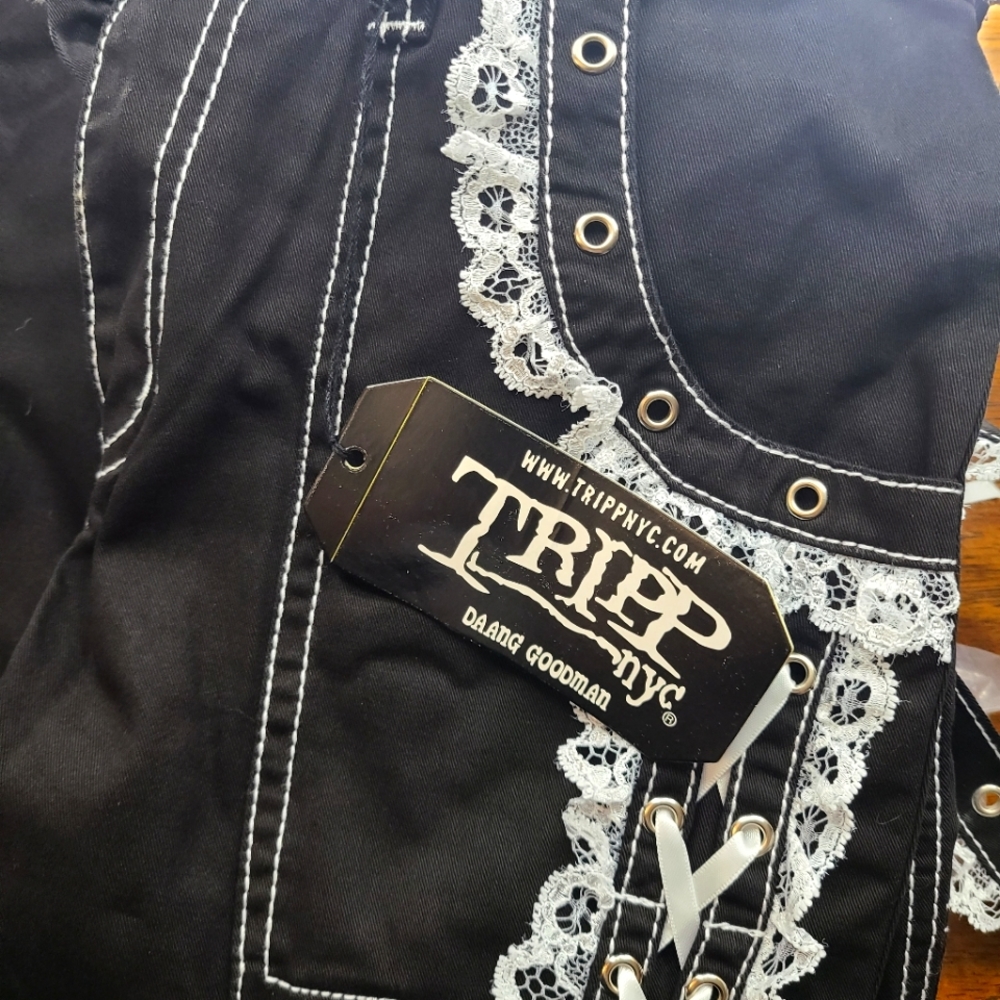 Size 27/5 Black and white Lolita Tripp pants.